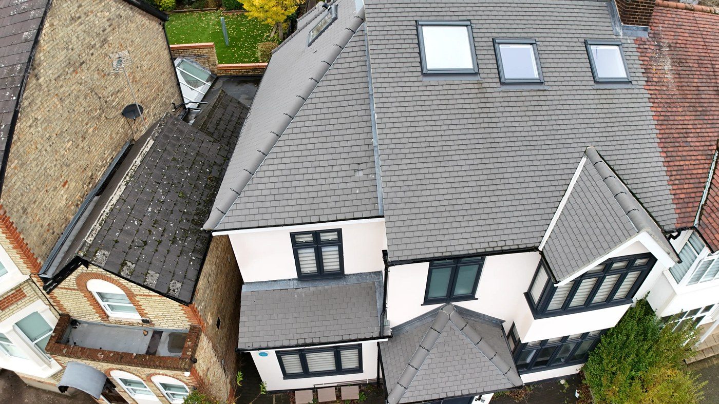 Oblique aerial view of the main rear pitched roof and dormer structure