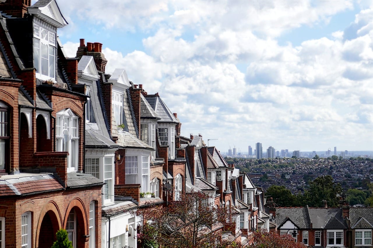 Busy residential street of Edwardian houses and flats in a North London suburb