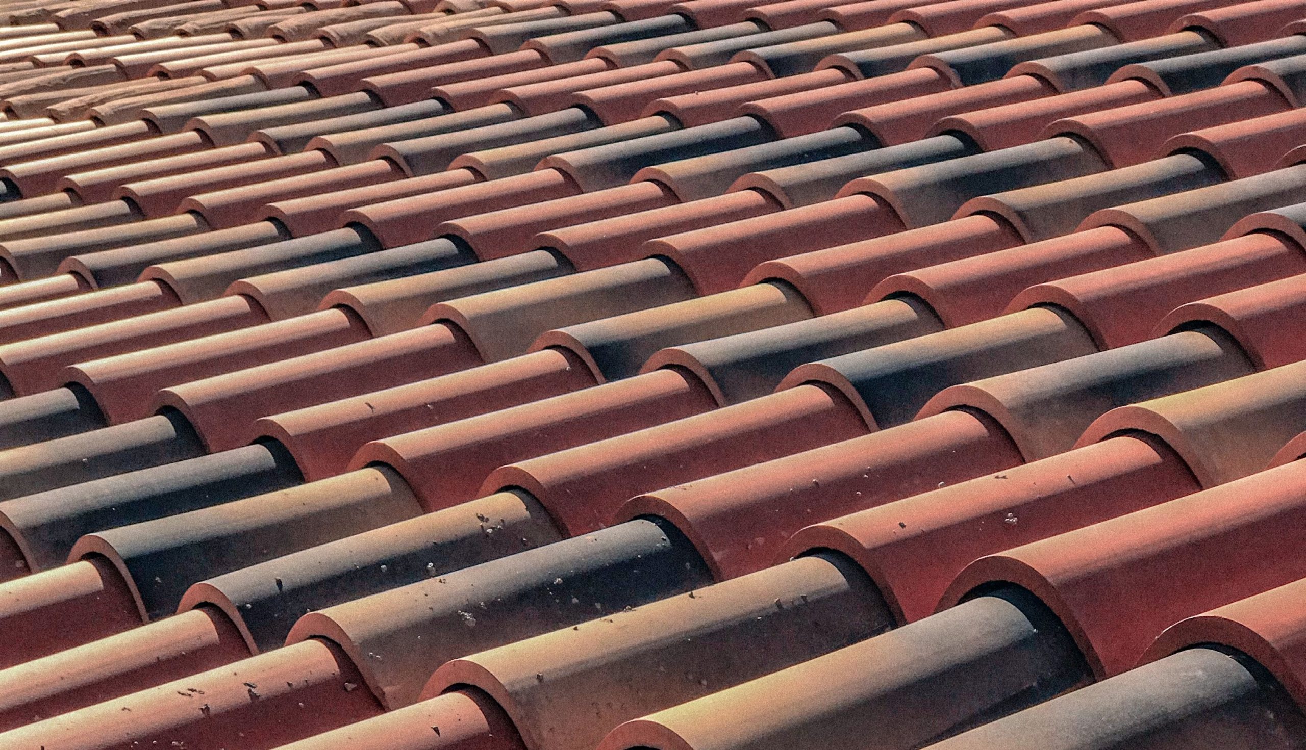 Close-up of terracotta roof tiles on a residential property